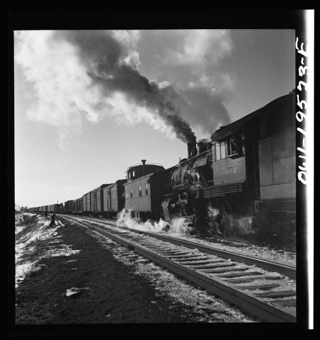 Untitled photo, possibly related to: Chillicothe, Illinois. Changing crews and cabooses of a westbound freight train al…