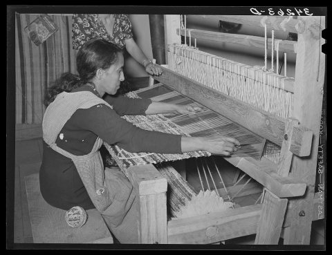 RugMakingWomanPassesShuttle