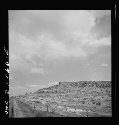McCartys (vicinity), New Mexico. Passing by an Indian reservation along the Atchison, Topeka and Santa Fe Railroad betw…