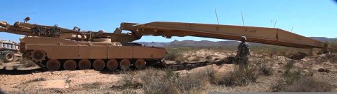 Soldiers of the 2nd Engineer Battalion construct a bridge for the 3rd Battalion, 41st Infantry Regiment during training…
