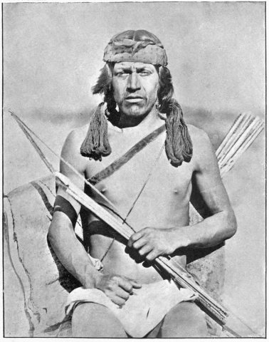 CEX D369 A Nambe indian in war costume