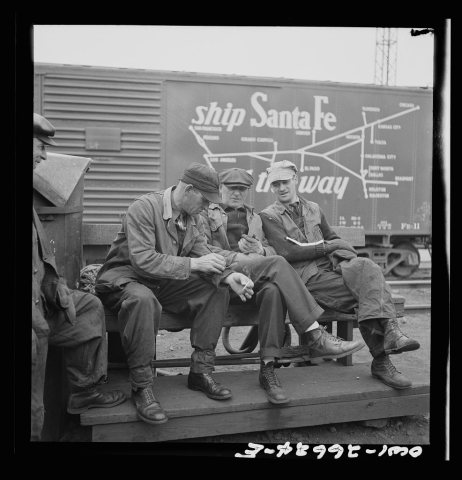 Cicero, Illinois. Switchmen discussing their switch lists at the Clyde yard of the Chicago, Burlington and Quincy Railr…