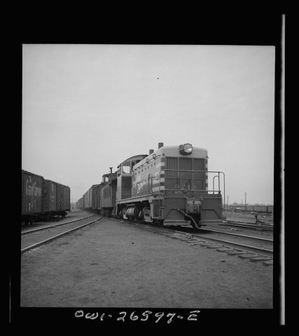 Cicero, Illinois. Switching cars with a diesel switch engine at the Clyde yard of the Chicago, Burlington and Quincy Ra…