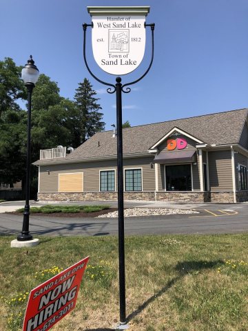 2024-06-20 14 48 40 Sign for the hamlet of West Sand Lake at the intersection of New York State Route 43 and New York S…