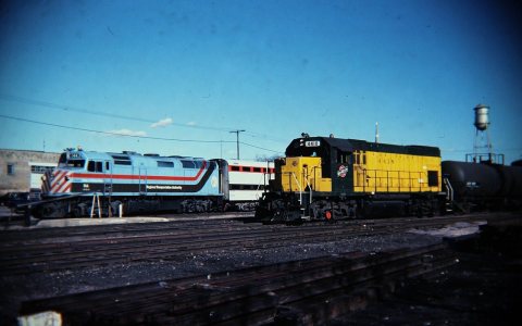 Chicago & North Western CNW 4418 (GP15-1) & Regional Transportation Authority RTA 144 (F40PH)