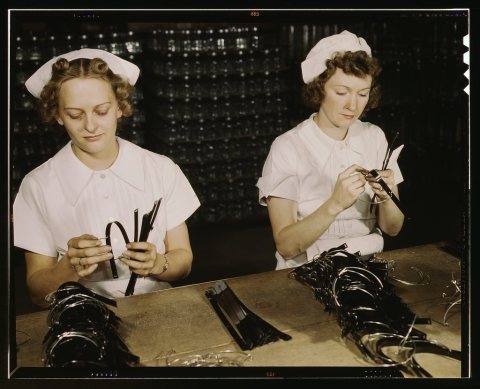 Two Navy wives, Eva Herzberg and Elve Burnham, entered war work after their husbands joined the service