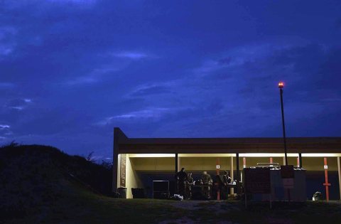 Members of US Air Forces Europe (USAFE) Defender Challenge team prepare for night firing competition at the Laughlin Ai…