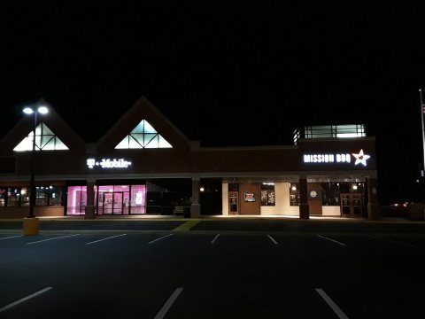 Shops at Greenbriar Shopping Center at night