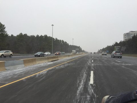 2016-01-22 13 18 43 Whisps of snow blowing around on a busy road (northbound Virginia State 28 (Sully Road) near milepo…