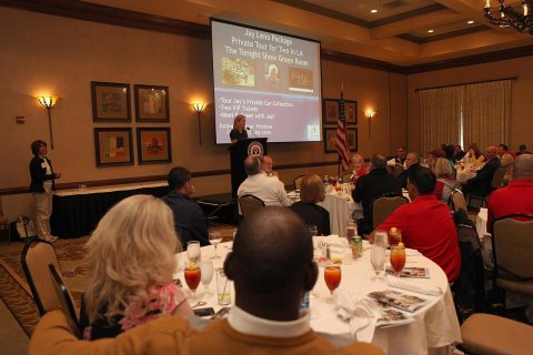 Brianna Keilar, the master of ceremonies and CNN White House correspondent, auctions off prizes at the 10th Anniversary…