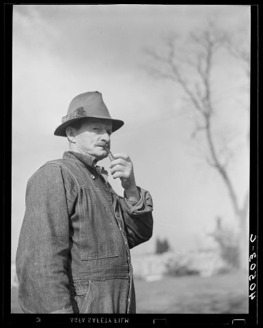Untitled photo, possibly related to: Retired railroad engineer who owns twenty-five acre farm. Raises corn and wheat ne…