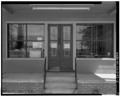 Detail of front (northwest) elevation door and windows, looking southeast. - Downtown Short Pump Grocery, West Broad St…