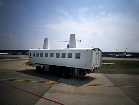 Mobile lounges that locals call "people movers," ferrying passengers to their planes from the terminal at Dulles Intern…