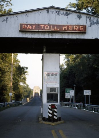 Quaint toll bridge across the Wabash River from Illinois to New Harmony, Indiana, a onetime utopian community northwest…