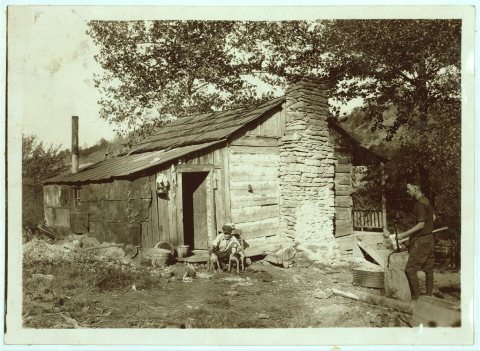 A little log cabin, - relic of the old days, - now occupied by a small family (F.T. Castle) who are gradually giving up…