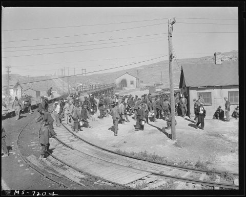 Miners from the morning shift walk to the mine office from shuttle cars at end of their shift. Union Pacific Coal... - …