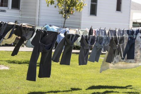 Hand-washed clothes hang out to dry on an Amish farm near the settlement of Topeka in LaGrange County, Indiana