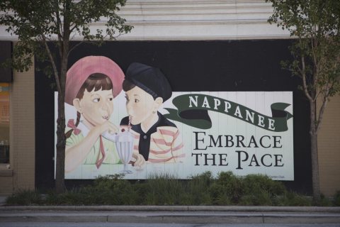 A family-style downtown mural welcomes visitors to Nappanee, Indiana, where drawing is part of the culture