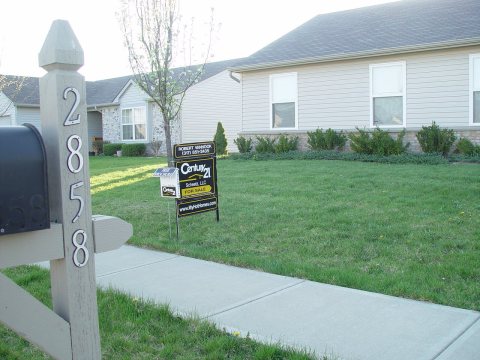 Century 21 real estate sign in
