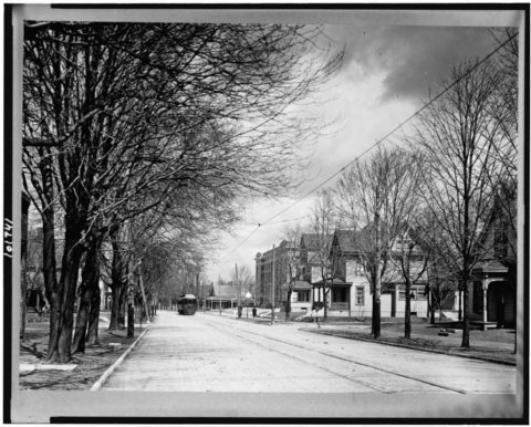 Street view with streetcar in background