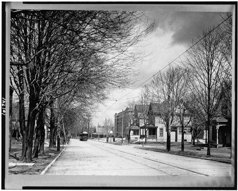 Street view with streetcar in background