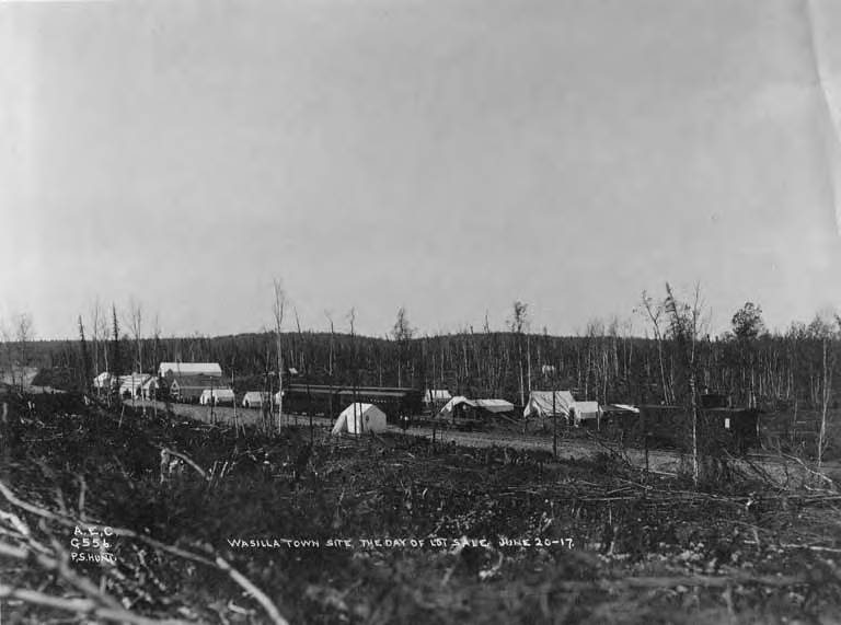 Alaska Railroad train cars on rail line between tents at Wasilla, Alaska, June 20, 1917