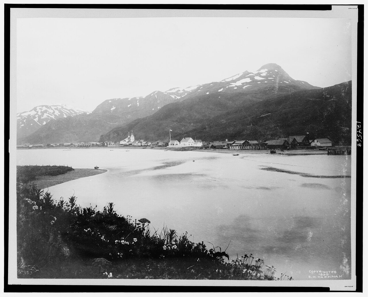 Body of water with mountains in background