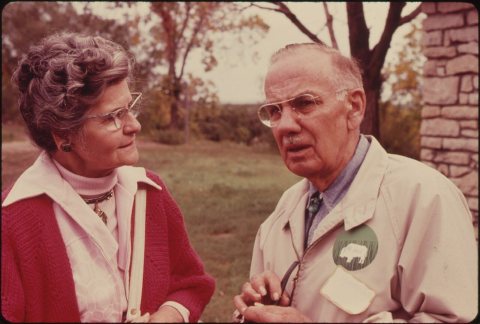 DR. E. RAYMOND HALL, THE FOUNDER OF THE MOVEMENT FOR A TALLGRASS PRAIRIE NATIONAL PARK, TALKS TO A WOMAN AT THE... - NA…