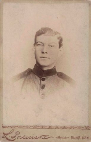 Portrait of young man by L Palinski of