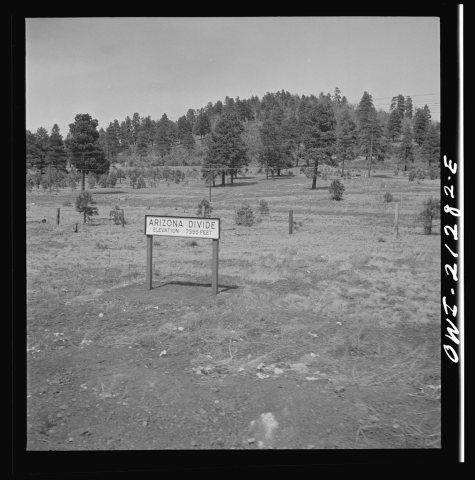 Williams (vicinity), Arizona. A sign marking the Arizona divide along the Atchison, Topeka and Santa Fe Railroad betwee…