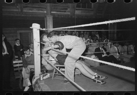 Second tending to boxer in corner of ring