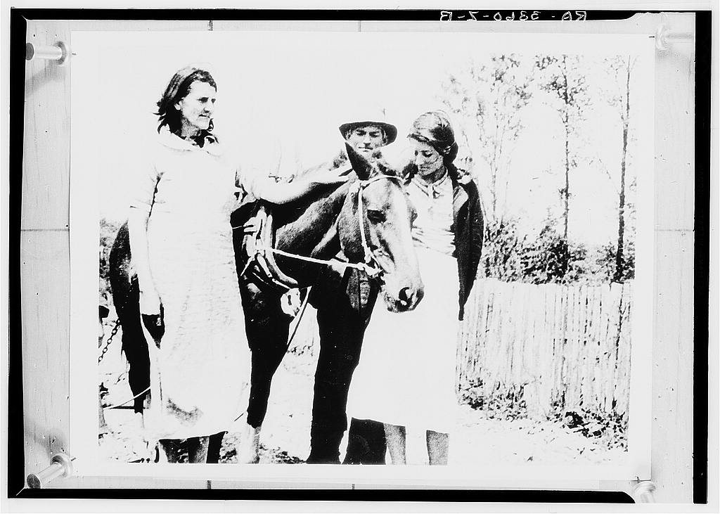 Jena, Louisiana. Paul J. Green and his wife and one of their daughters with the horse which they received from the Rura…