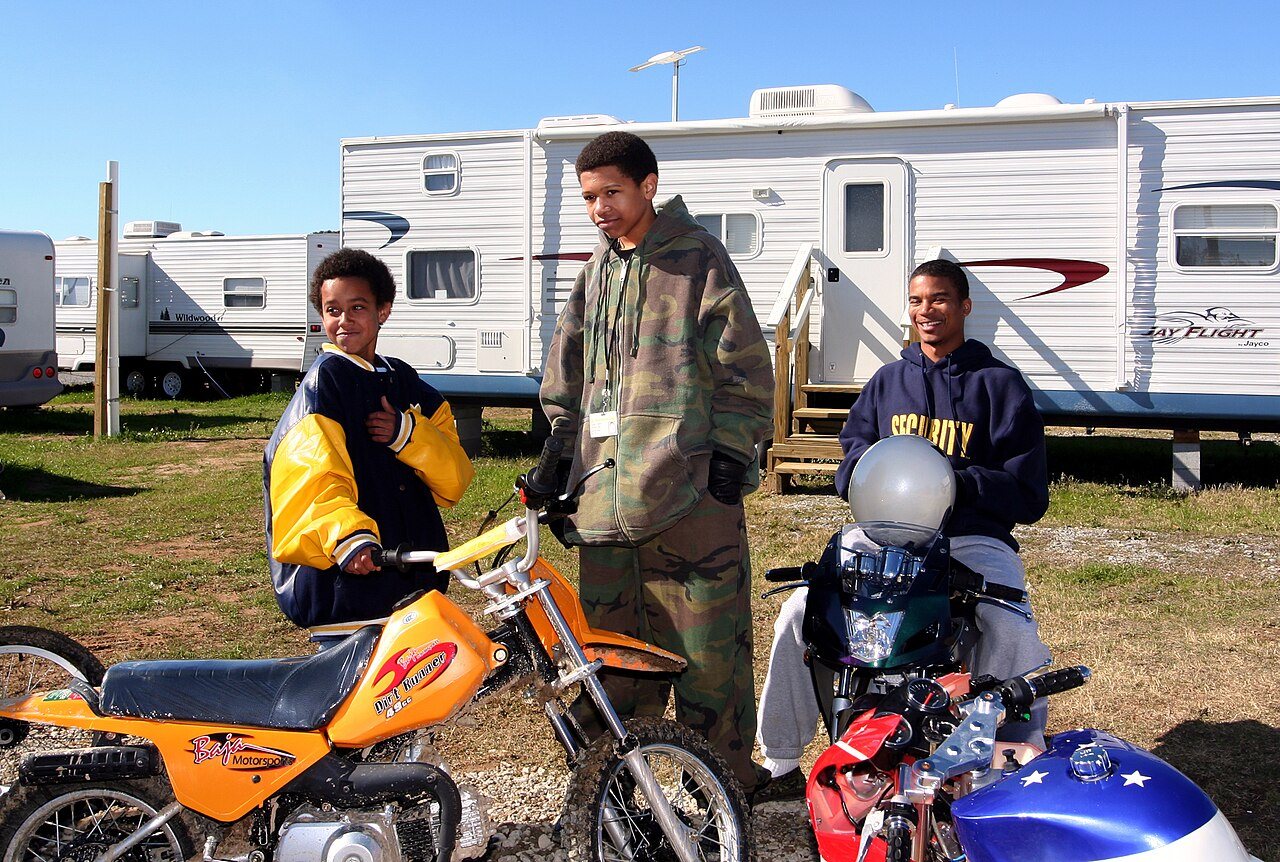 (Hurricane Katrina) Baker, LA December 25, 2005 - Holden Sylve, Cardez White, and Corey Zite compare their Christmas mo…