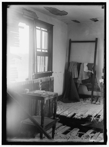 INDIAN HEAD, MD. NAVY PROVING GROUND. RESIDENCE OF GEORGE SWANN, DAMAGED BY 16' SHELL THAT HIT ANOTHER IN SANDBANK, AND…