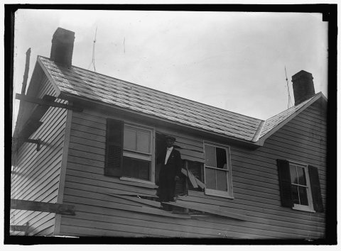 INDIAN HEAD, MD. NAVY PROVING GROUND. RESIDENCE OF GEORGE SWANN, DAMAGED BY 16' SHELL THAT HIT ANOTHER IN SANDBANK, AND…