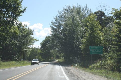 Suttons Bay Michigan Sign M-22