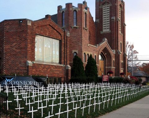 Abortion crosses traveling exhibition to represent the estimated number of annual pregnancy terminations