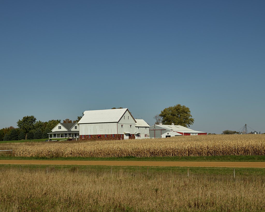 Farmstead with a prominent white barn near Hayward, Minnesota