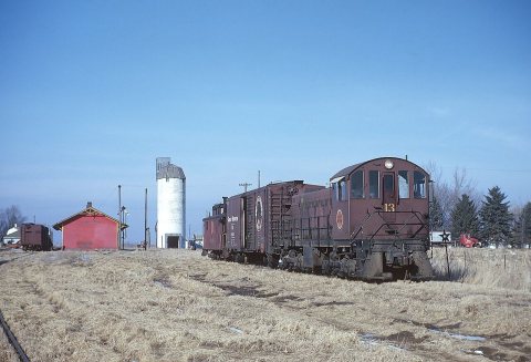 CGW 13 (S1) at end of line at Goodhue, MN Crew eating oyster stew in caboose, January 30, 1964
