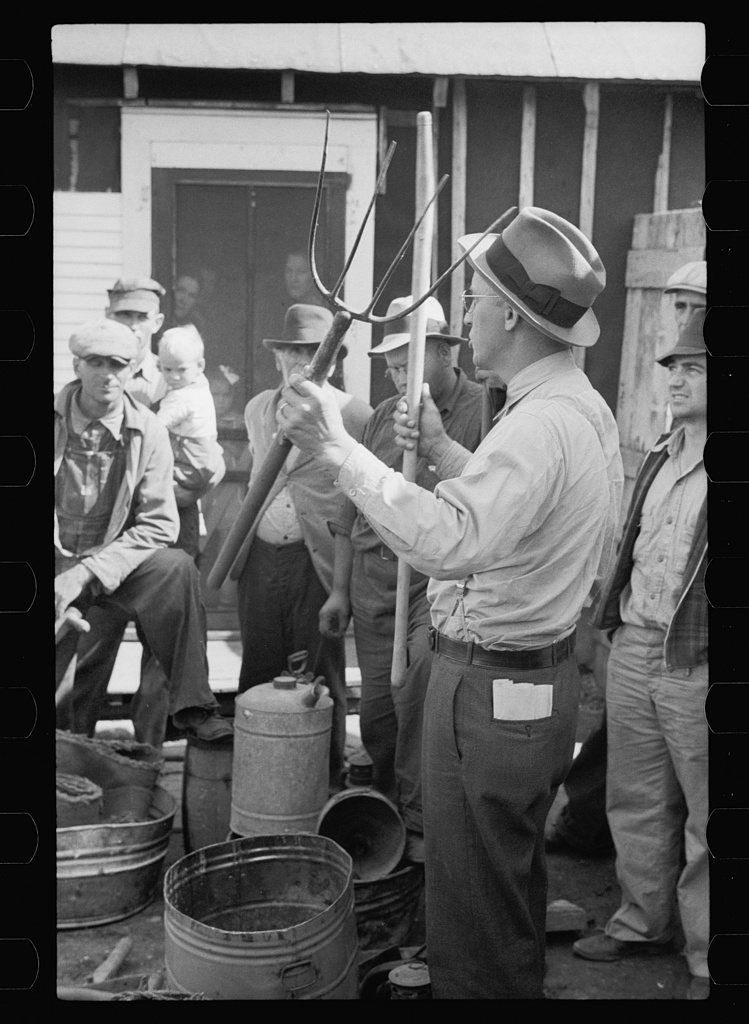 Auctioneer trying to sell pitchfork