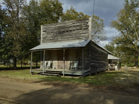 An old cabin that has the looks of an old-time store