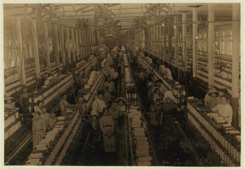 Interior of Magnolia (Miss.) Cotton Mills spinning room. See the little ones scattered through the mill. All work. See …