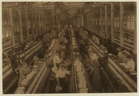 Interior of Magnolia (Miss.) Cotton Mills spinning room. See the little ones scattered through the mill. All work. See …