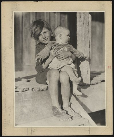 Very needy beneficiaries of the Red Cross drought funds on a plantation near Cleveland, Miss. Besides food, clothing, s…
