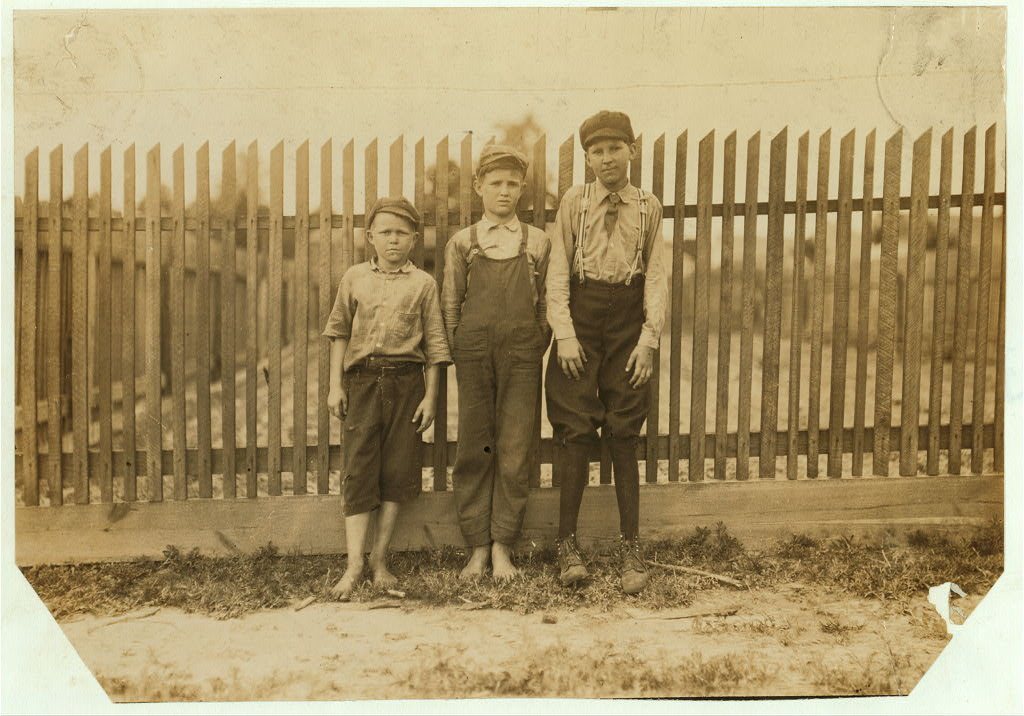 Noon at Delta Cotton Mills, Mc Comb, Miss. Three of the young workers. LOC nclc.02072