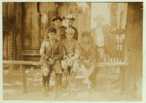 A Sunday hand-out of doffers and other mill fellows. Reputed a bad lot. Smallest boy is Arthur, said he was 13 (doubtfu…