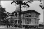 Mississippi. Biloxi. School building and children on playground
