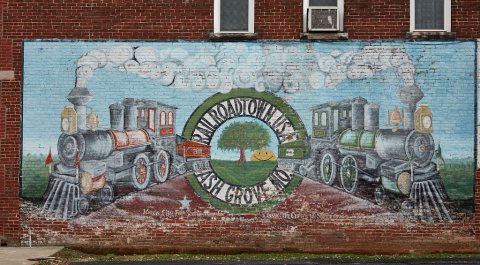 A weathered "Railroadtown U.S.A." mural
